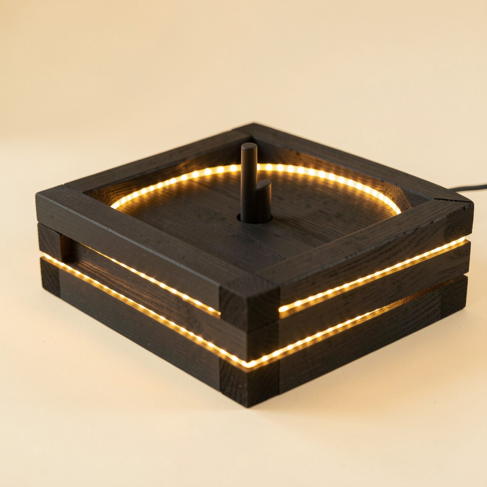 Close-up of a hand-built mini golf hole with LED lighting